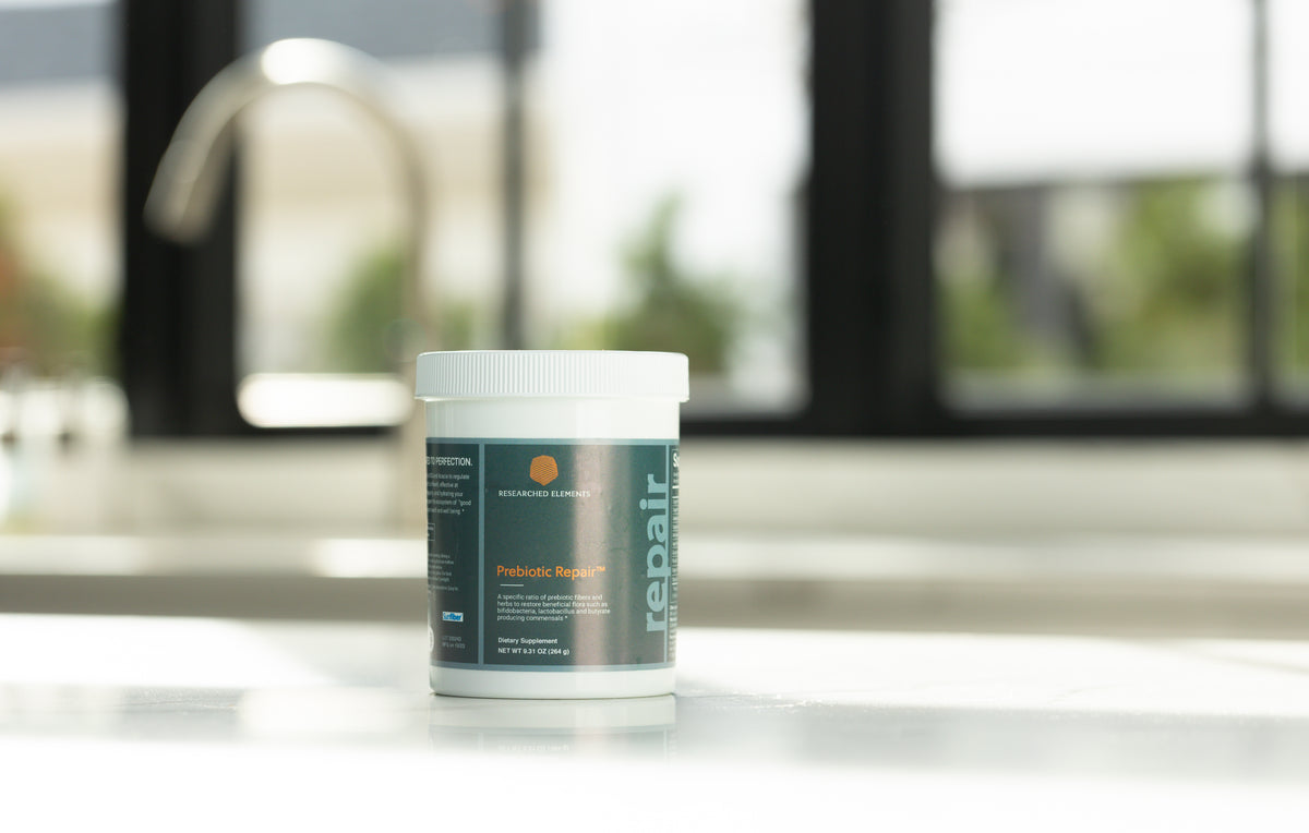 Prebiotic Repair jar on a kitchen counter, earlier label